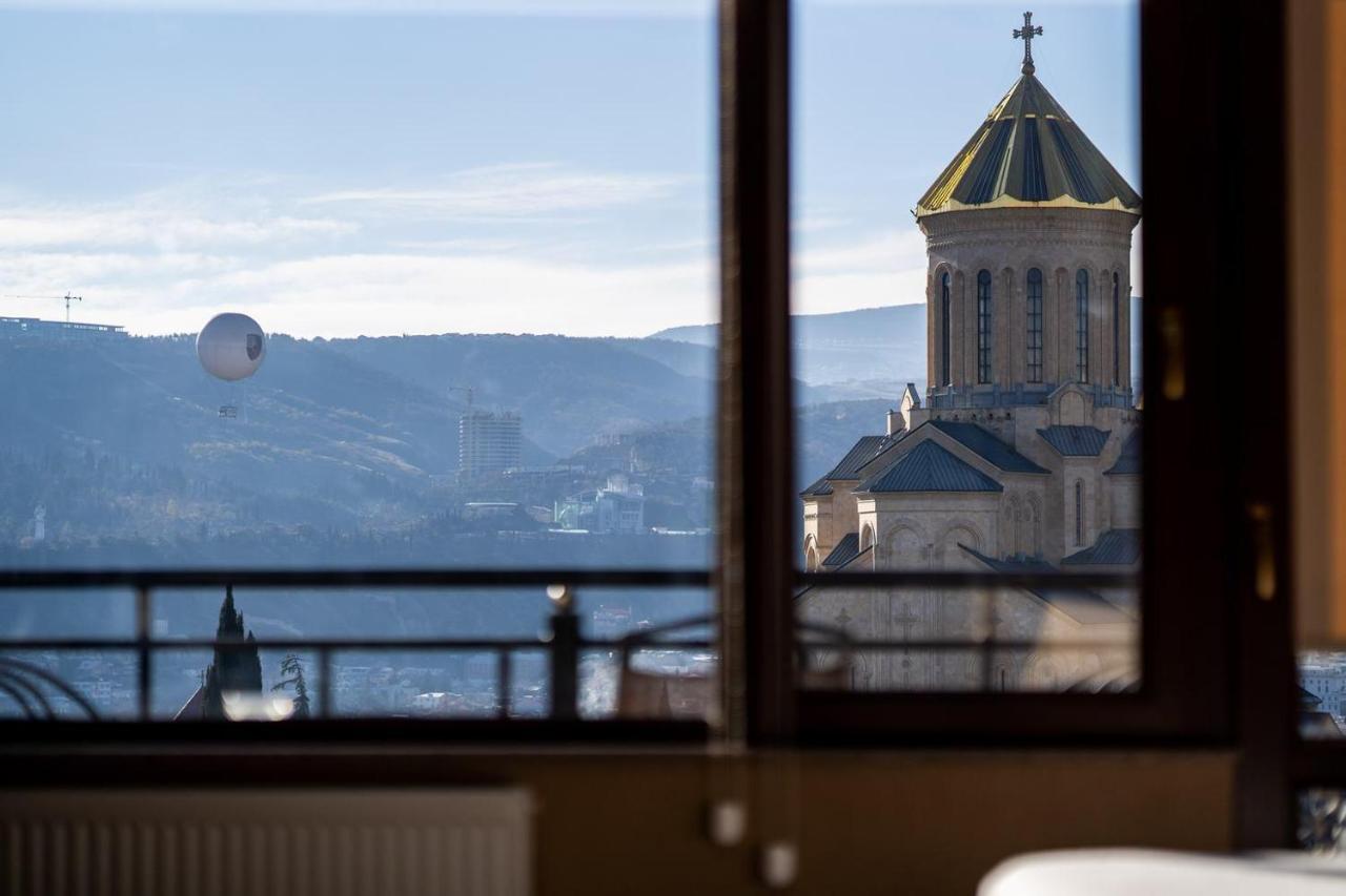 Siberia Hotel Tbilisi Exterior foto View of the monastery from the hotel